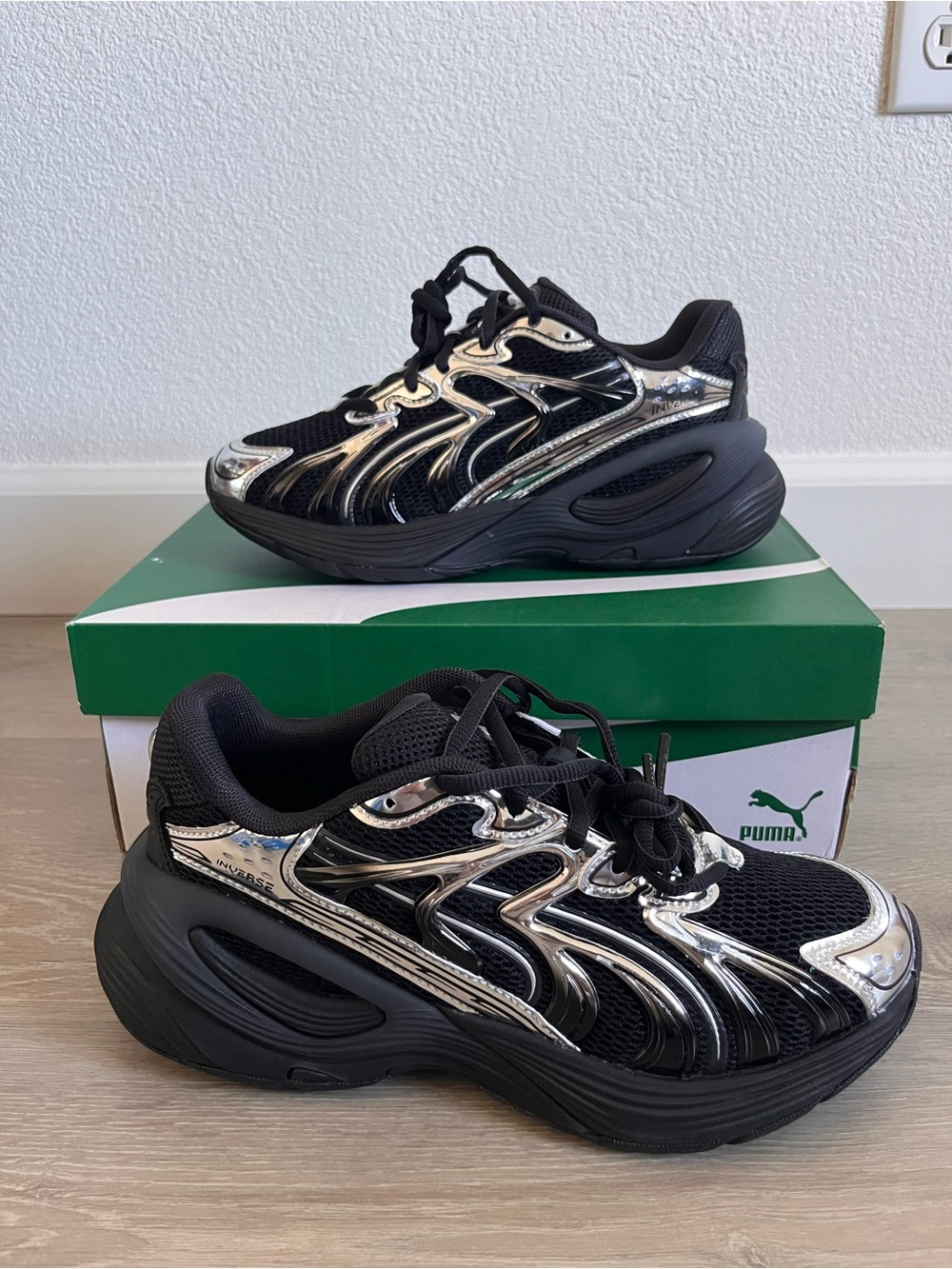 Puma Kids Black Sneakers with Metallic Silver Overlays